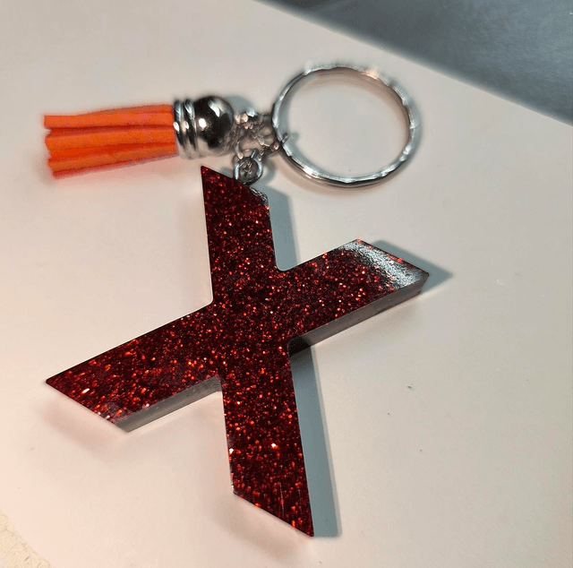 Porte clés initiale "X" rouge pailletté 