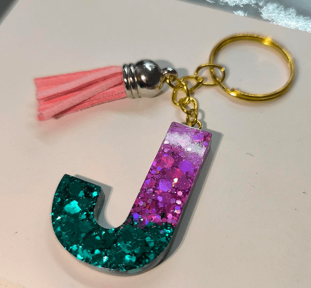 Porte clés initiale "J" rose et bleu pailletté 