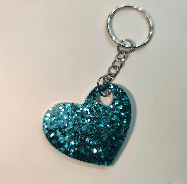 Porte clés coeur bleu turquoise pailleté 