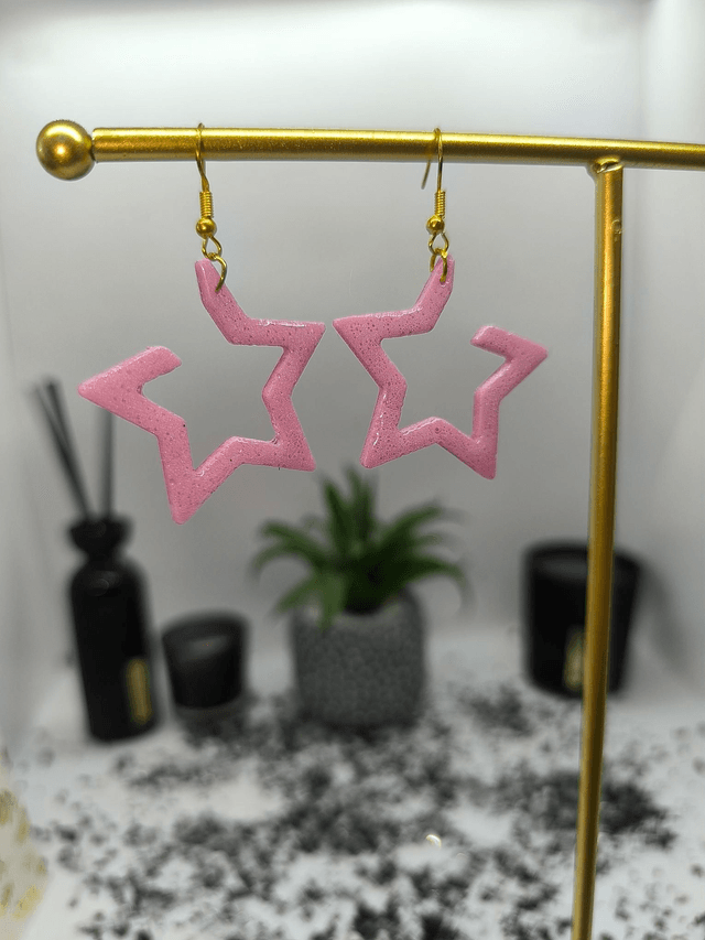 Boucles d'oreilles étoile rose nacré effet perforé 