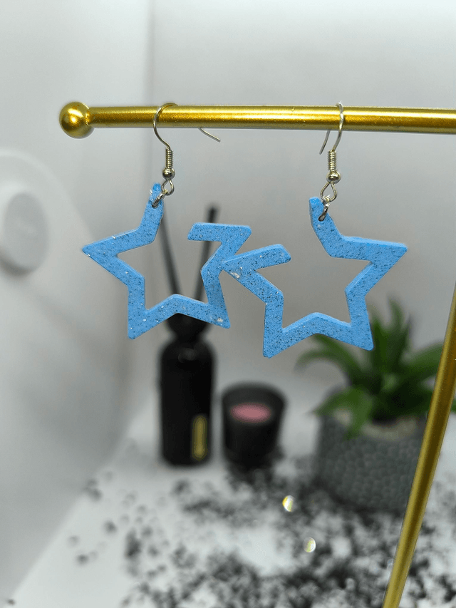 Boucles d'oreilles étoile bleu ciel pailletté 