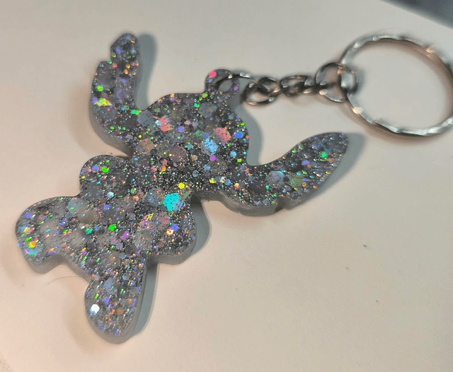 Porte clés Stitch argenté holographique 