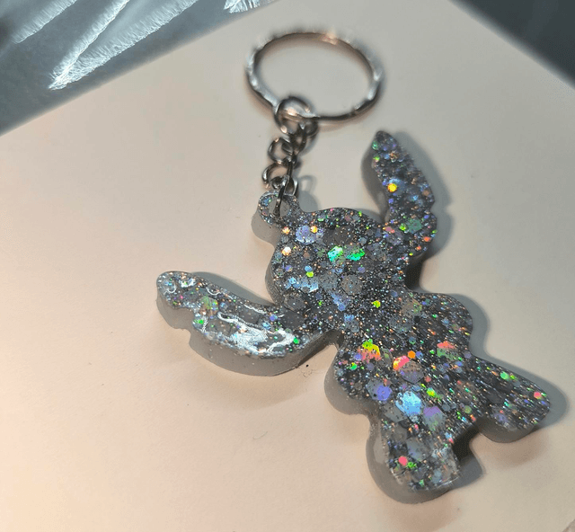 Porte clés Stitch argenté holographique 