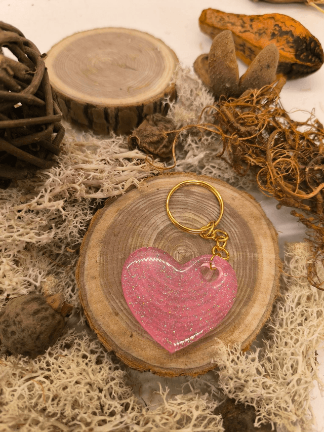 Porte clés coeur rose fluo pailletté 