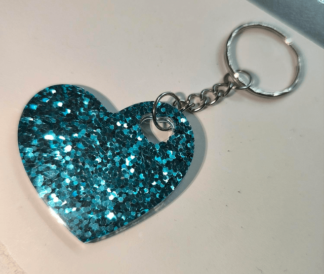 Porte clés coeur bleu turquoise pailleté 