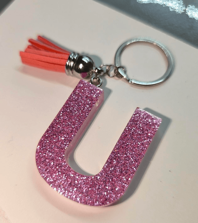 Porte clés initiale "U" rose pailletté 