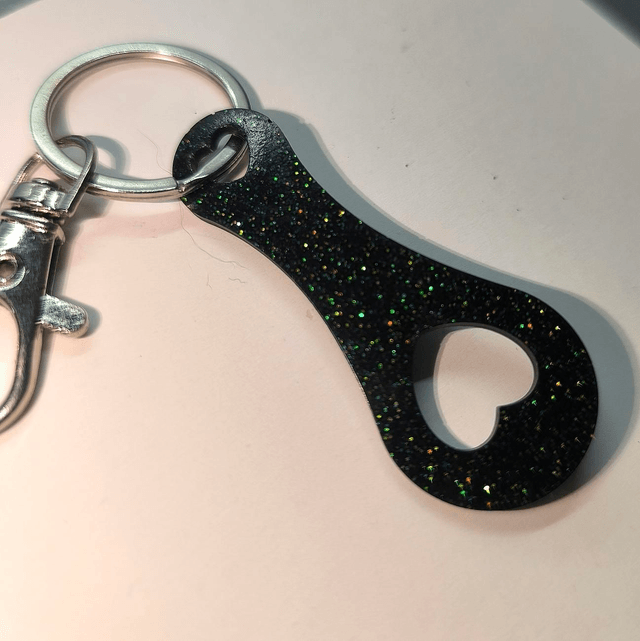 Jeton de caddie noir à paillettes vertes 