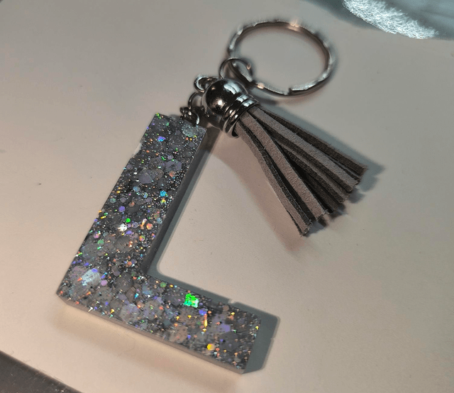 Porte clés initiale "L" argenté holographique 