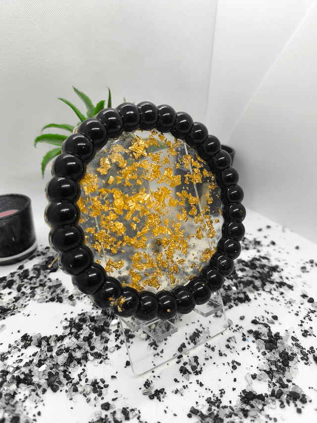 Plateau rond bubble noir et feuilles d'or 