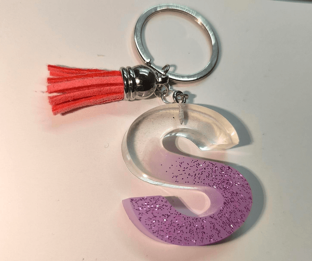 Porte clés initiale "S" transparent et rose pailletté 