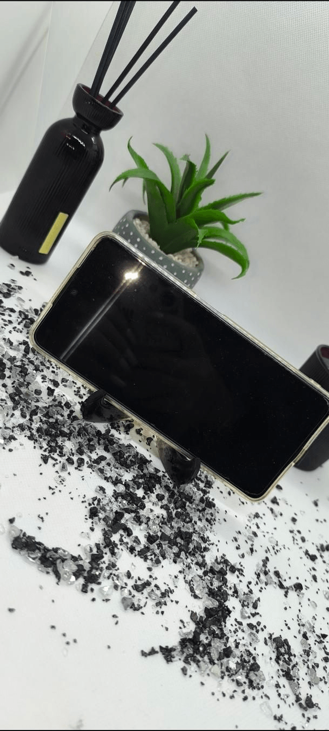 Porte téléphone transportable noir et feuilles d'or 