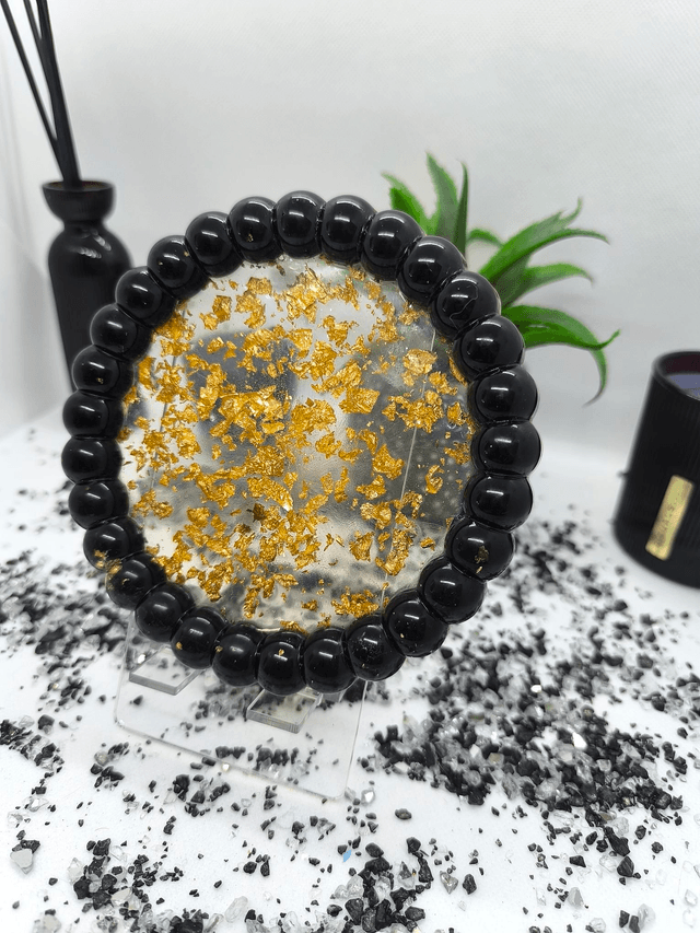 Plateau rond bubble noir et feuilles d'or 