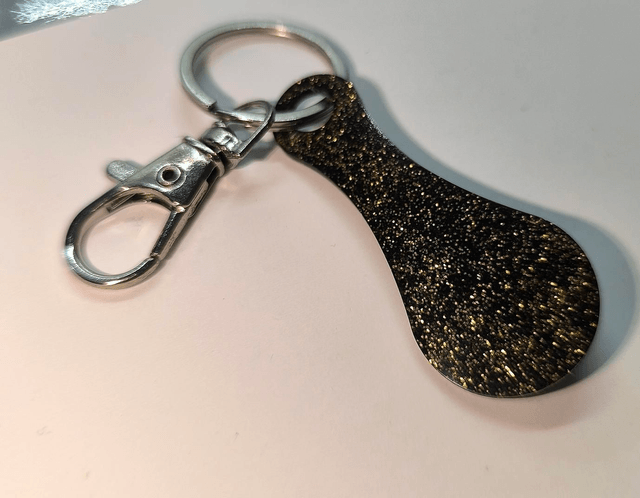 Jeton de caddie noir et doré 