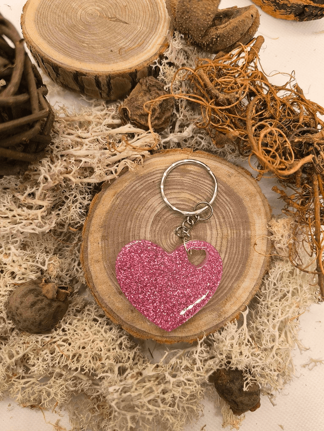 Porte clés coeur rose pailletté 