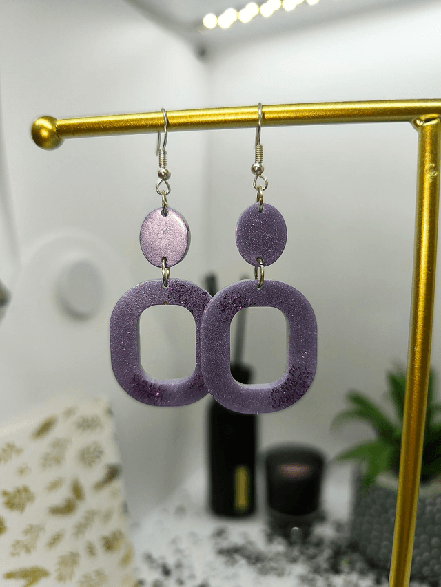 Boucles d'oreilles ovale pendante mauve nacré 