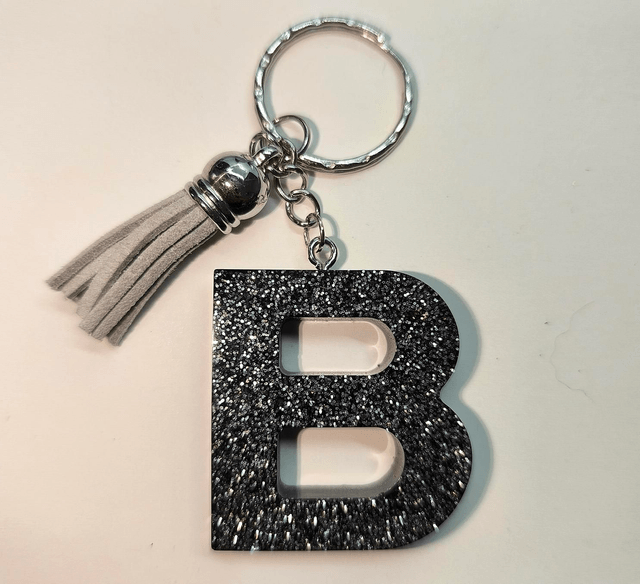 Porte clés initiale "B" noir pailleté 