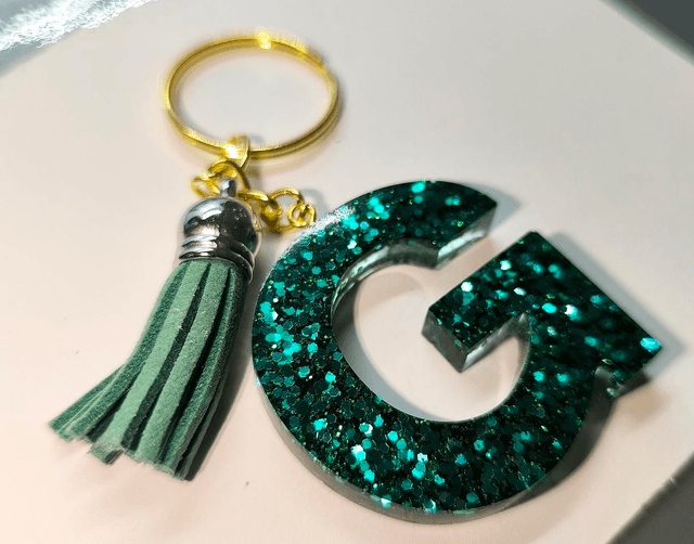 Porte clés initiale "G" pailleté bleu vert 
