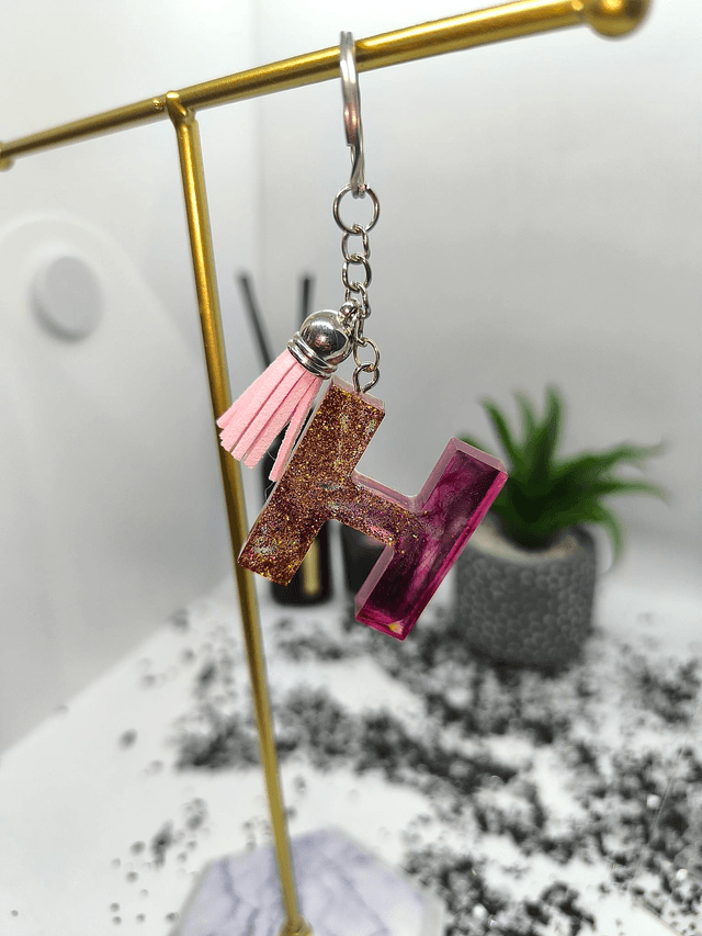 Porte clés initiale "H" doré rose fumé 