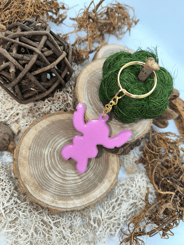 Porte clés Stitch rose nacré 