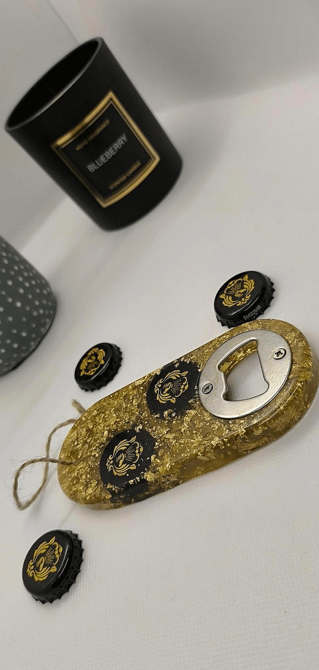 Décapsuleur avec incrustation feuilles d'or 