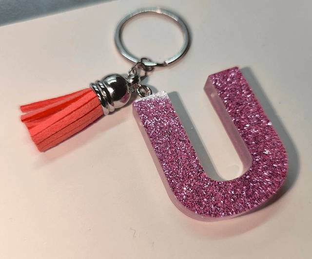 Porte clés initiale "U" rose pailletté 