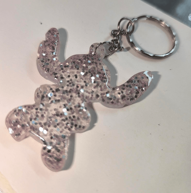 Porte clés Stitch paillettes rondes argentées 