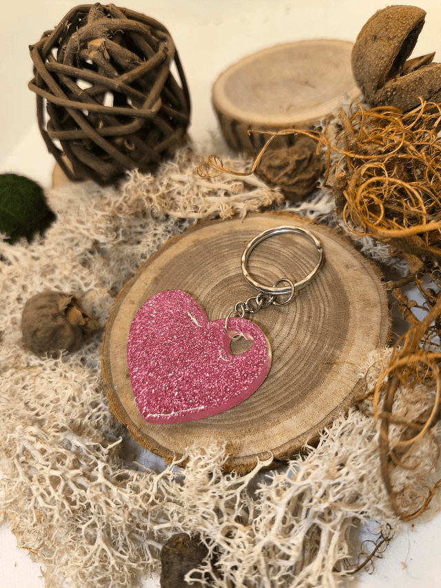 Porte clés coeur rose pailletté 
