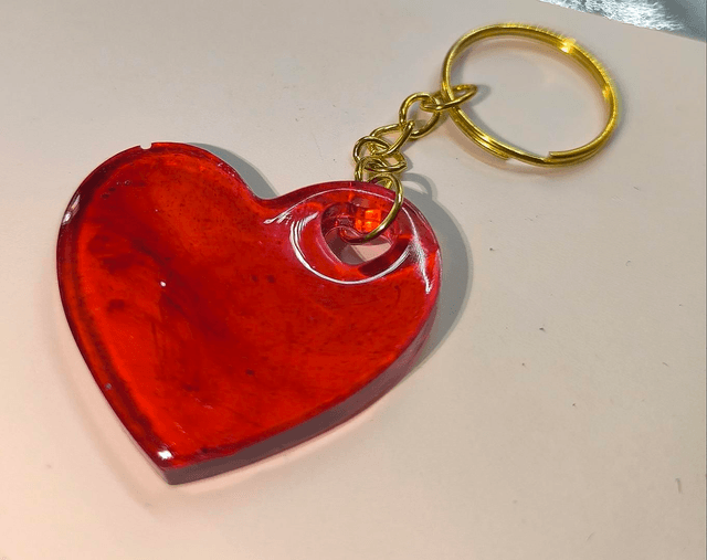 Porte clés coeur rouge fumé 