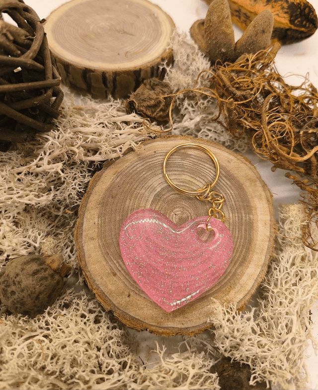 Porte clés coeur rose fluo pailletté 