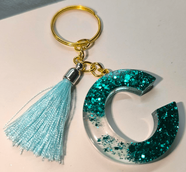 Porte clés initiale "C" pailleté bleu vert 