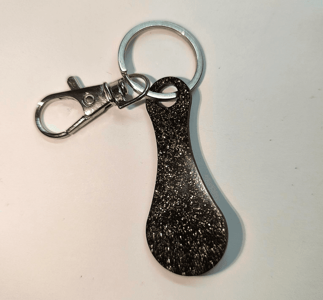 Jeton de caddie noir et doré 