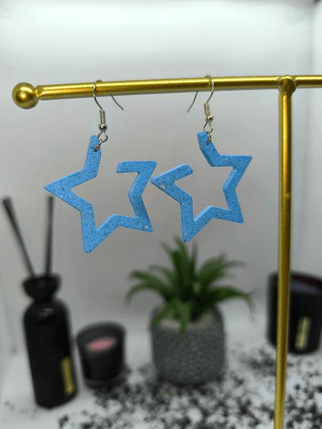 Boucles d&#039;oreilles étoile bleu ciel pailletté 