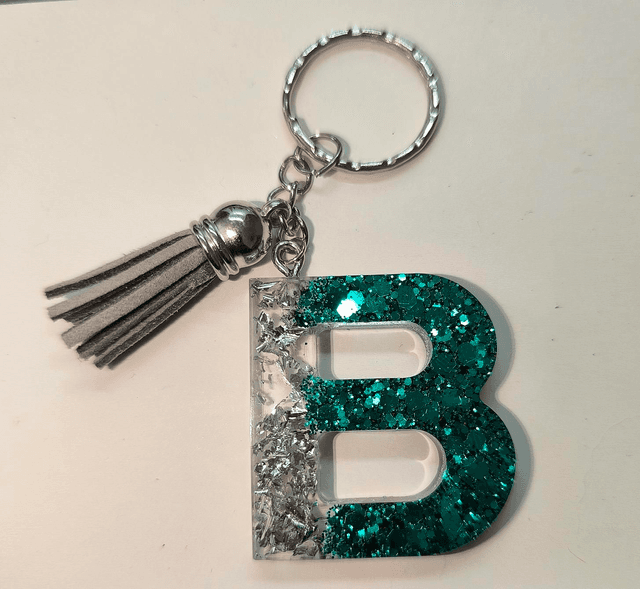 Porte clés initiale &quot;B&quot; bleu vert pailletté et feuilles argentées 