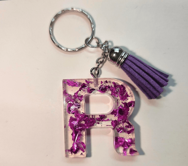 Porte clés initiale &quot;R&quot; feuilles rose fuschia 