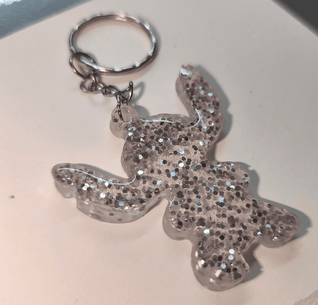 Porte clés Stitch paillettes rondes argentées 