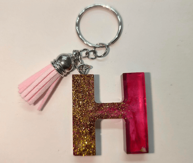 Porte clés initiale &quot;H&quot; doré rose fumé 